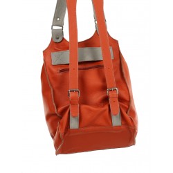 Orange backpack with a handbag function.