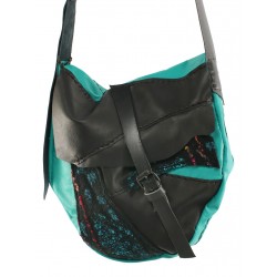 Large women's leather shoulder bag with an artistic touch
