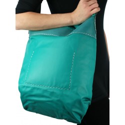 Large hand-sewn leather handbag in turquoise color
