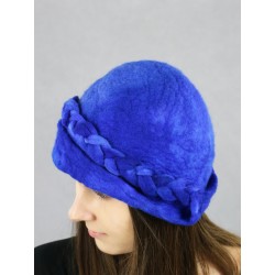 Hand-felted hat with a decorative braid.