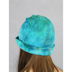 Hand-felted hat with a decorative braid.