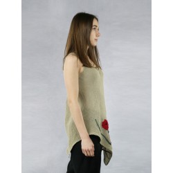 A linen blouse with straps with an asymmetrical hem and sewn-on flowers.