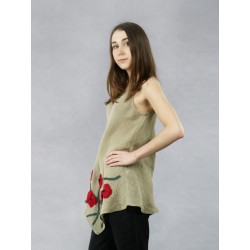 A linen blouse with straps with an asymmetrical hem and sewn-on flowers.