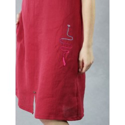 Short, maroon linen dress with decorative colored stitching