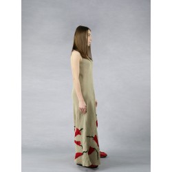 Artistic linen dress with sewn-on dresses, made of a bias.