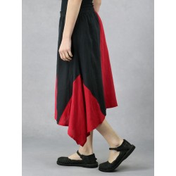 Lniana spódnica asymetryczna midi, uszyta z kawałków tkanin w kolorach czarnoczerwonych.