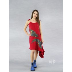 Red asymmetric linen dress with tied straps, decorated with hand-painted peacock feathers