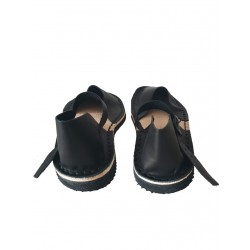 Black flat women's sandals, hand-sewn from natural leather