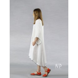 White linen dress with a longer back, decorated with black stitching