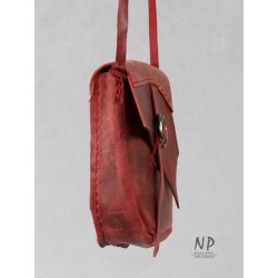 Dark red small handmade leather handbag, handcrafted by a plastic artist