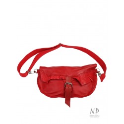 A red women's sachet made by hand from natural leather