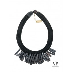 Dark gray, hand-made necklace made of cotton string and ceramic ornaments