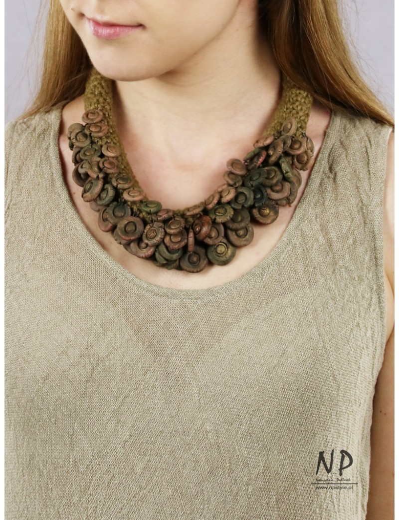 Gold-tone handmade necklace made of linen threads and ceramic ornaments