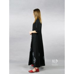 Long black shirt dress fastened with coconut buttons, decorated with hand-painted dandelions