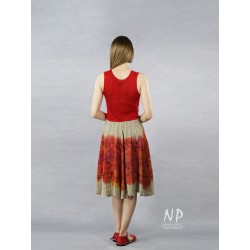 Red linen dress with straps, with a flared bottom, decorated with hand-painted patterns