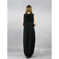 Black linen dress with a hood decorated with a hand-painted face in contrasting colors