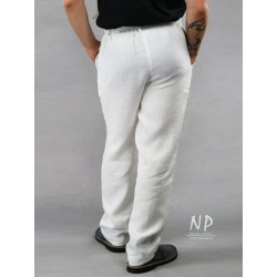 Men's white linen trousers with an elasticated belt