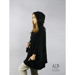 Oversized black linen jacket with a hood, made in the form of a poncho