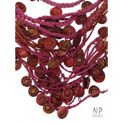 Handmade colorful necklace, made of linen and cotton strings, decorated with ceramic beads