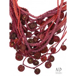 Handmade colorful necklace, made of linen and cotton strings, decorated with ceramic beads
