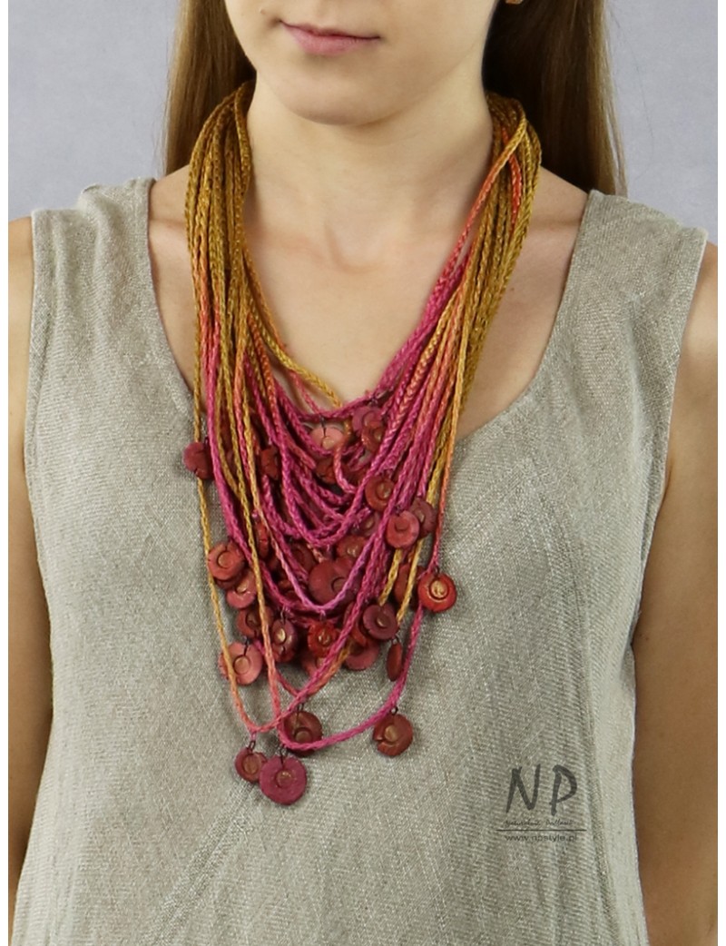 Handmade colorful necklace, made of linen braided strings, decorated with ceramic beads