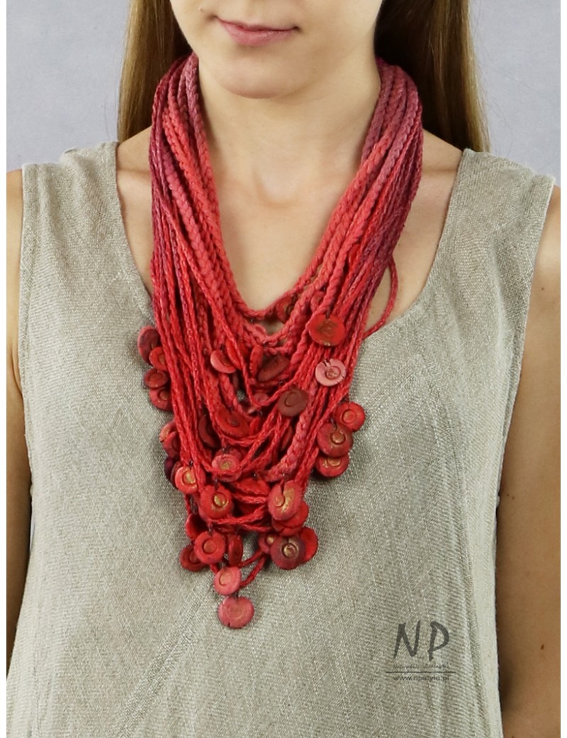 Handmade red necklace, made of braided strings, decorated with ceramic beads