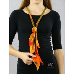 Long necklace made of felt in the form of a twig with leaves in orange colors with an attached brooch