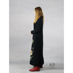 Long black knitted turtleneck dress decorated with hand-painted saxophone