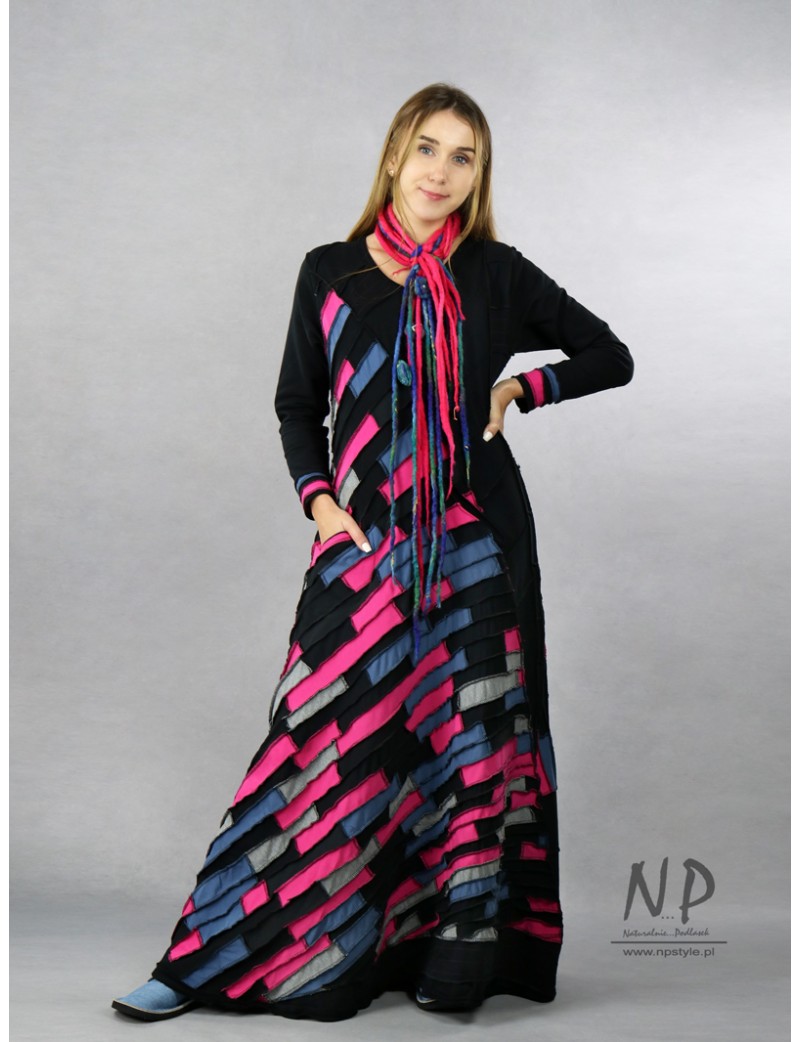 Long, knitted black patchwork dress with the addition of colorful pieces of fabric