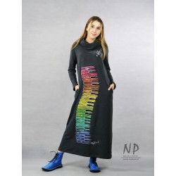Long, gray knitted turtleneck dress decorated with a hand-painted colorful piano keyboard