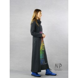 Long, gray knitted turtleneck dress decorated with a hand-painted colorful piano keyboard