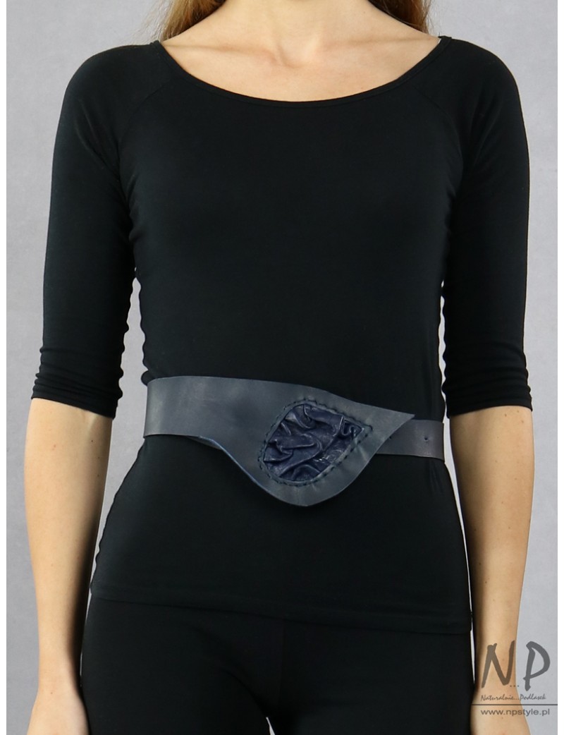 A wide decorative navy blue leather belt for the dress