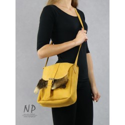Hand-sewn medium-sized leather shoulder bag with an adjustable strap