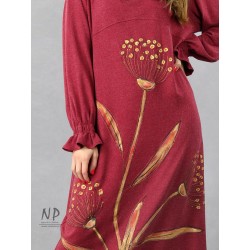 Burgundy knitted turtleneck dress decorated with hand-painted flowers.