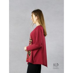 Ladies' maroon oversize blouse with an asymmetrical hem, decorated with hand-painted patterns.