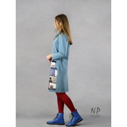 Blue short jersey dress with turtleneck, pockets and 3/4 sleeves.
