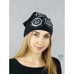 Black knitted cotton cap decorated with hand-painted patterns