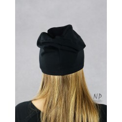 Black knitted cotton cap decorated with hand-painted patterns