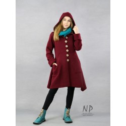 Short, burgundy steamed wool coat with a hood and elongated sides