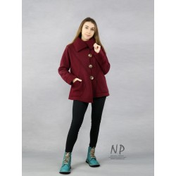 Warm, burgundy winter jacket with a high collar, made of steamed wool