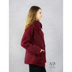 Warm, burgundy winter jacket with a high collar, made of steamed wool