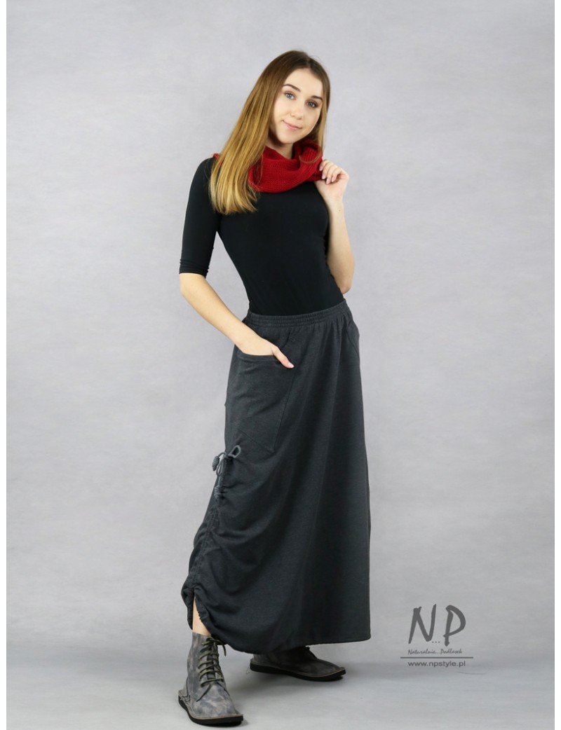 Gray long knitted skirt with an elastic band with adjustable length