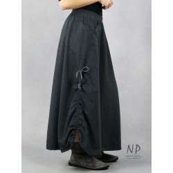Gray long knitted skirt with an elastic band with adjustable length