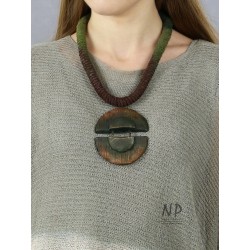 The original necklace with ceramics on a braided string