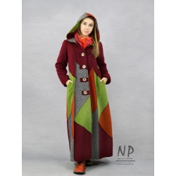 Long, patchwork winter coat with a hood, made of steamed wool