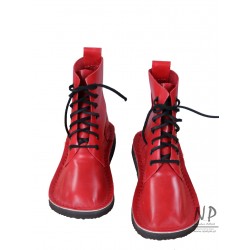 Red hand-sewn leather Basic 7 hiking boots, laced with a strap
