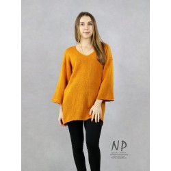 Honey woolen women's oversize sweater with low sewn in wider sleeves ¾