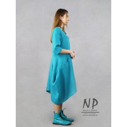 Turquoise short linen dress with a sleeve at the elbow and elongated corners