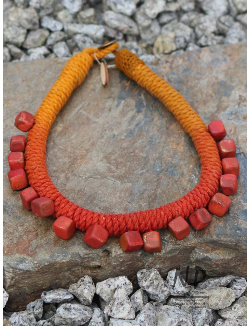 Women's necklace made of dyed cotton string and decorated with hand-made ceramics