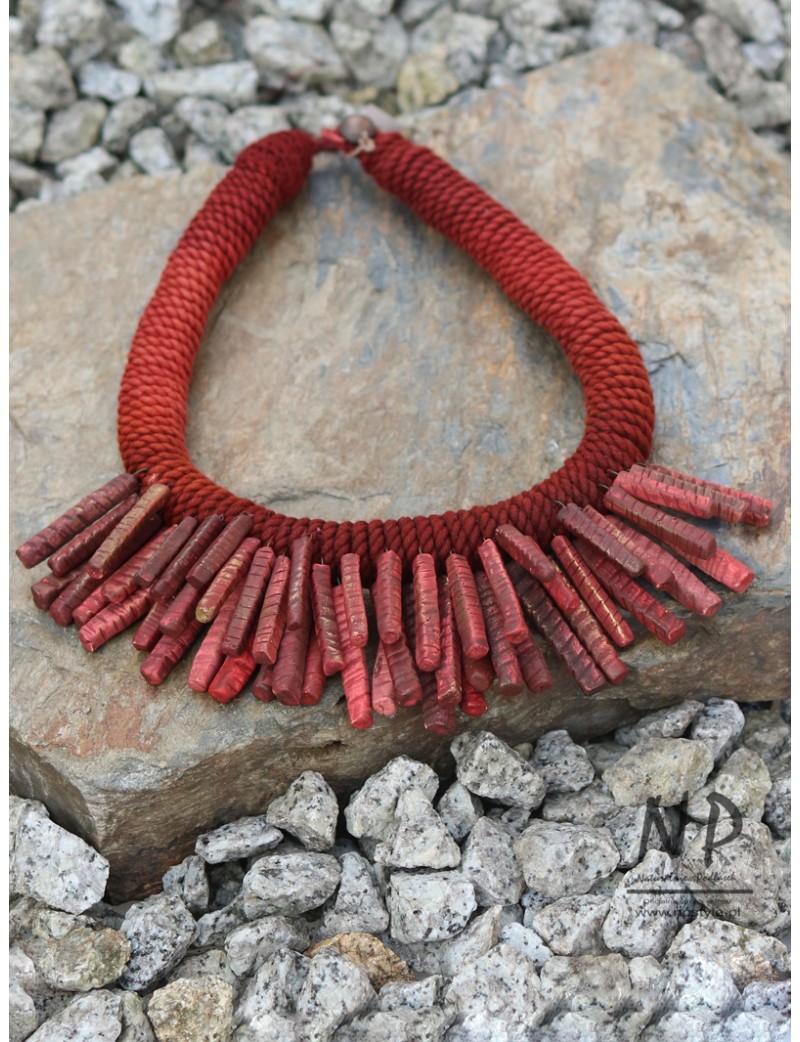 Women's necklace made of colored string, decorated with ceramics